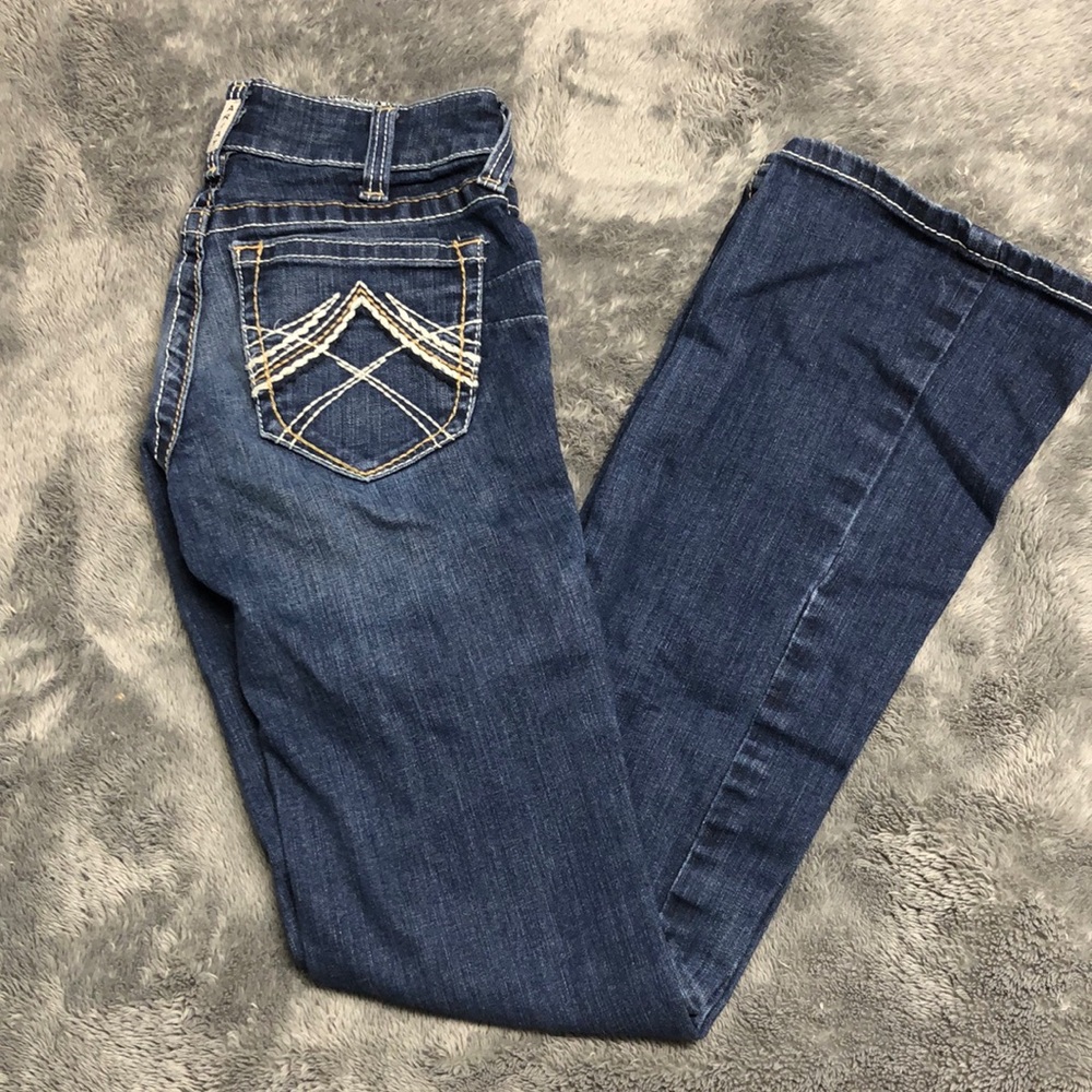 Size 25 Long Bootcut Ariat jeans .